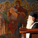 Ikone mit orthodoxen Priester im Vordergrund