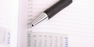 Terminkalender und Stift