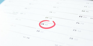 Terminkalender mit rot markiertem Datum